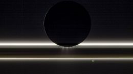 卡西尼号拍摄的土卫二在土星环附近漂移的照片